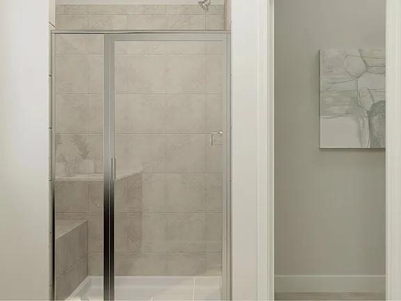 208 Eden View Bend Raleigh, NC 27610 - Photo 14 of 14 a bathroom with a glass shower door