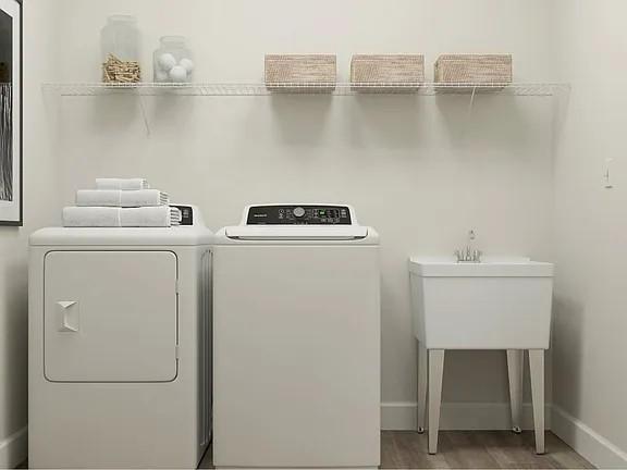 208 Eden View Bend Raleigh, NC 27610 - Photo 8 of 14 a utility room with dryer and washer