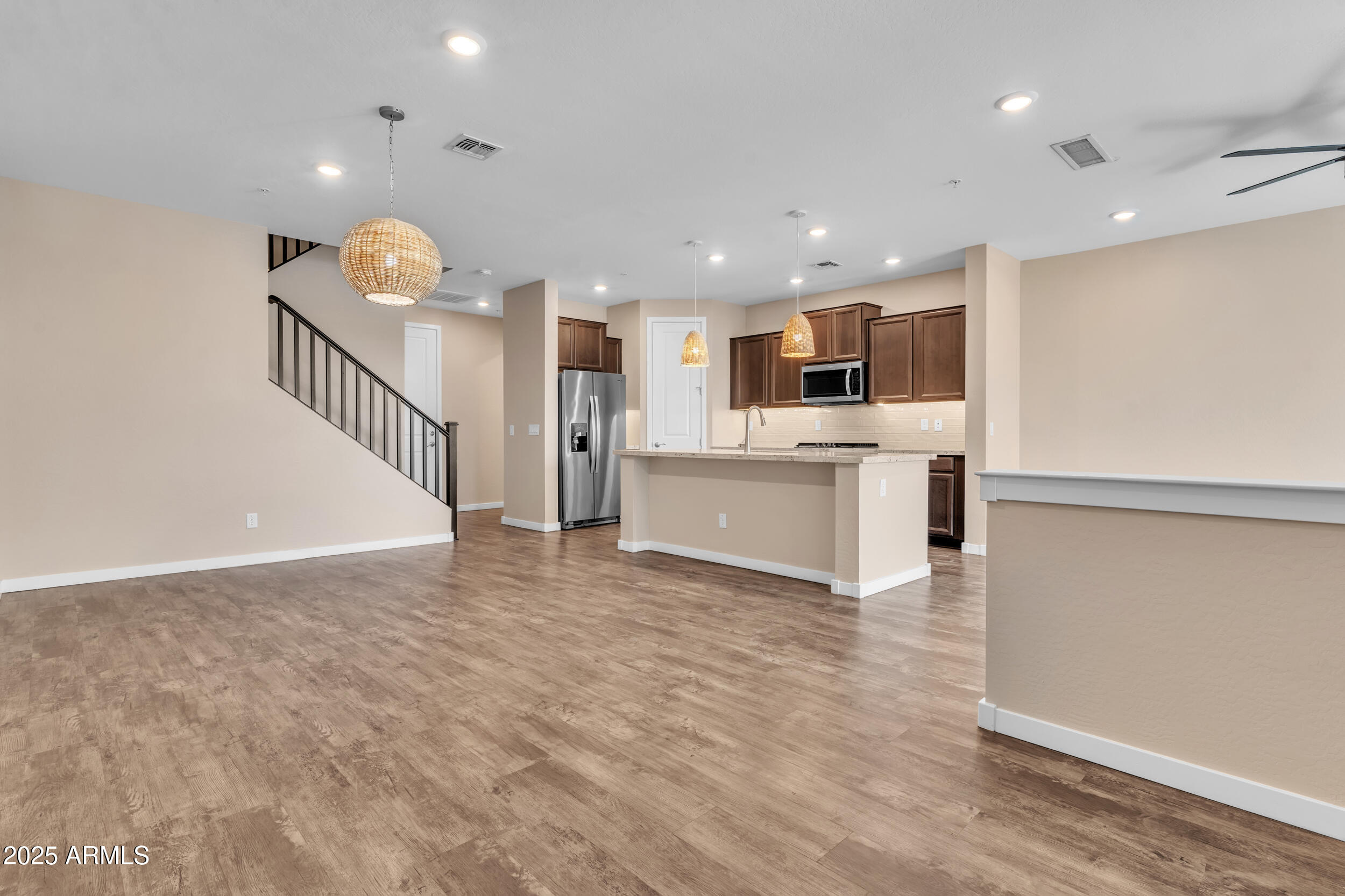 3855 South McQueen Road, Unit 98 Chandler, AZ 85286 - Photo 14 of 41 a view of a kitchen with a sink stainless steel appliances and cabinets