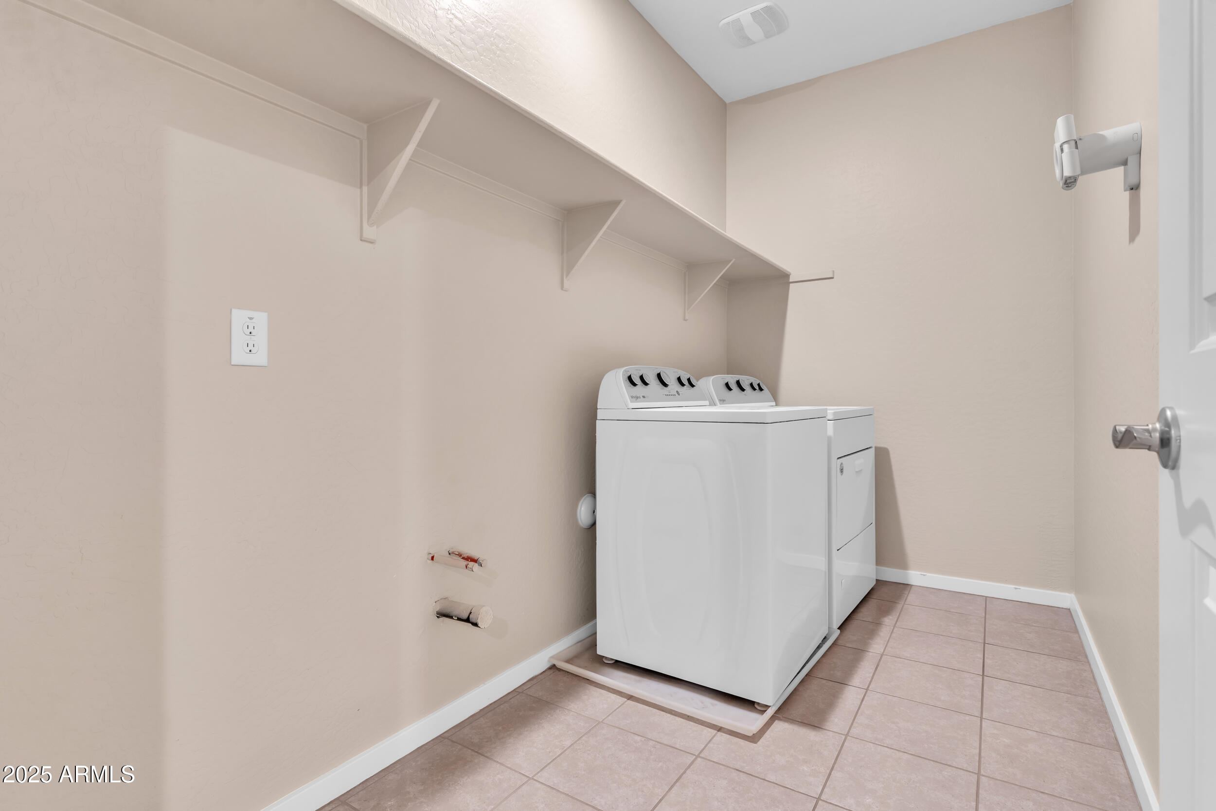 3855 South McQueen Road, Unit 98 Chandler, AZ 85286 - Photo 17 of 41 a utility room with dryer and washer