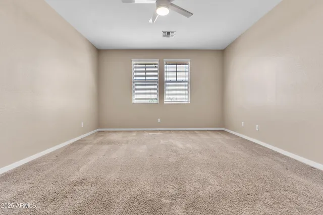 a bathroom with a sink toilet and a mirror