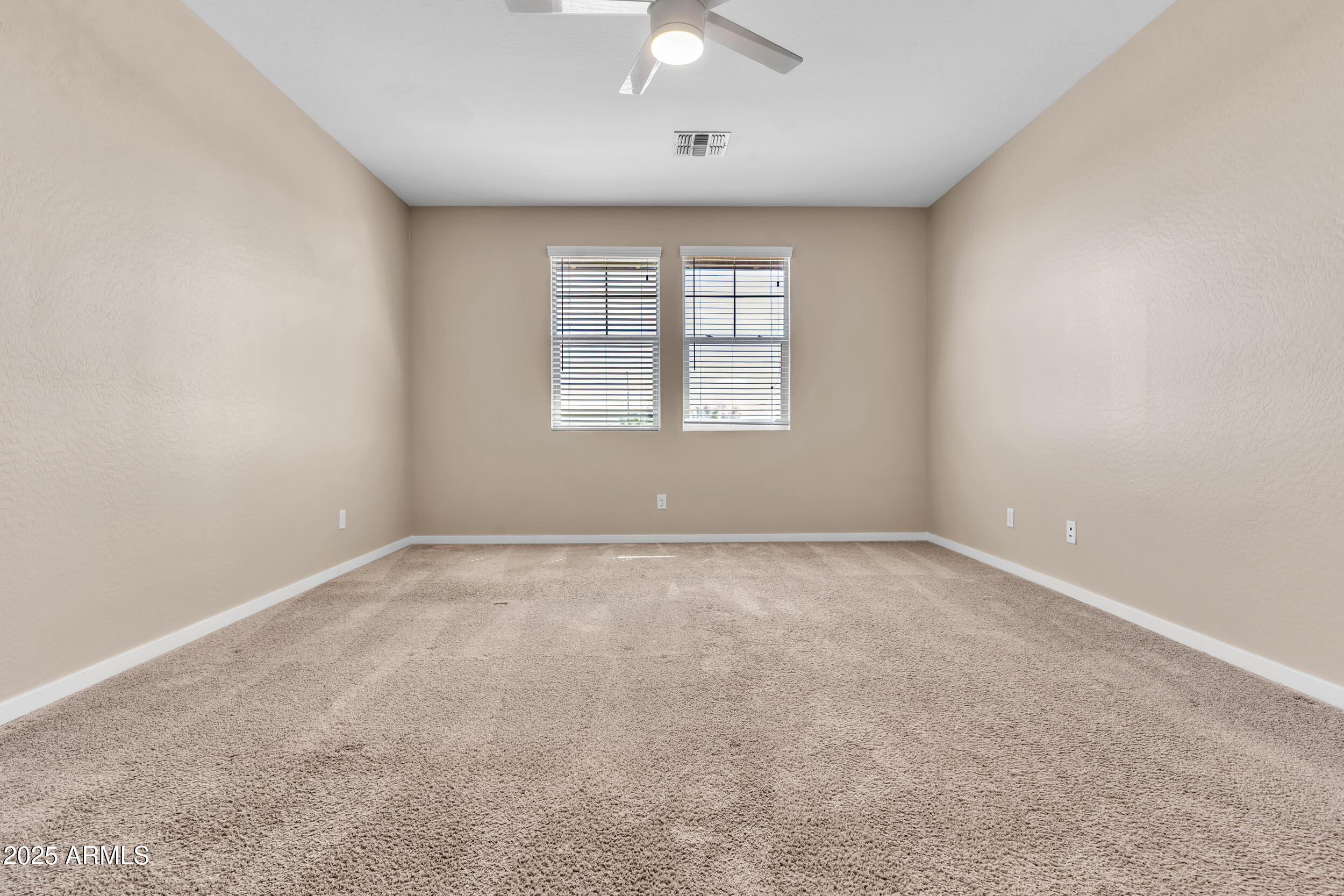 3855 South McQueen Road, Unit 98 Chandler, AZ 85286 - Photo 18 of 41 an empty room with a window