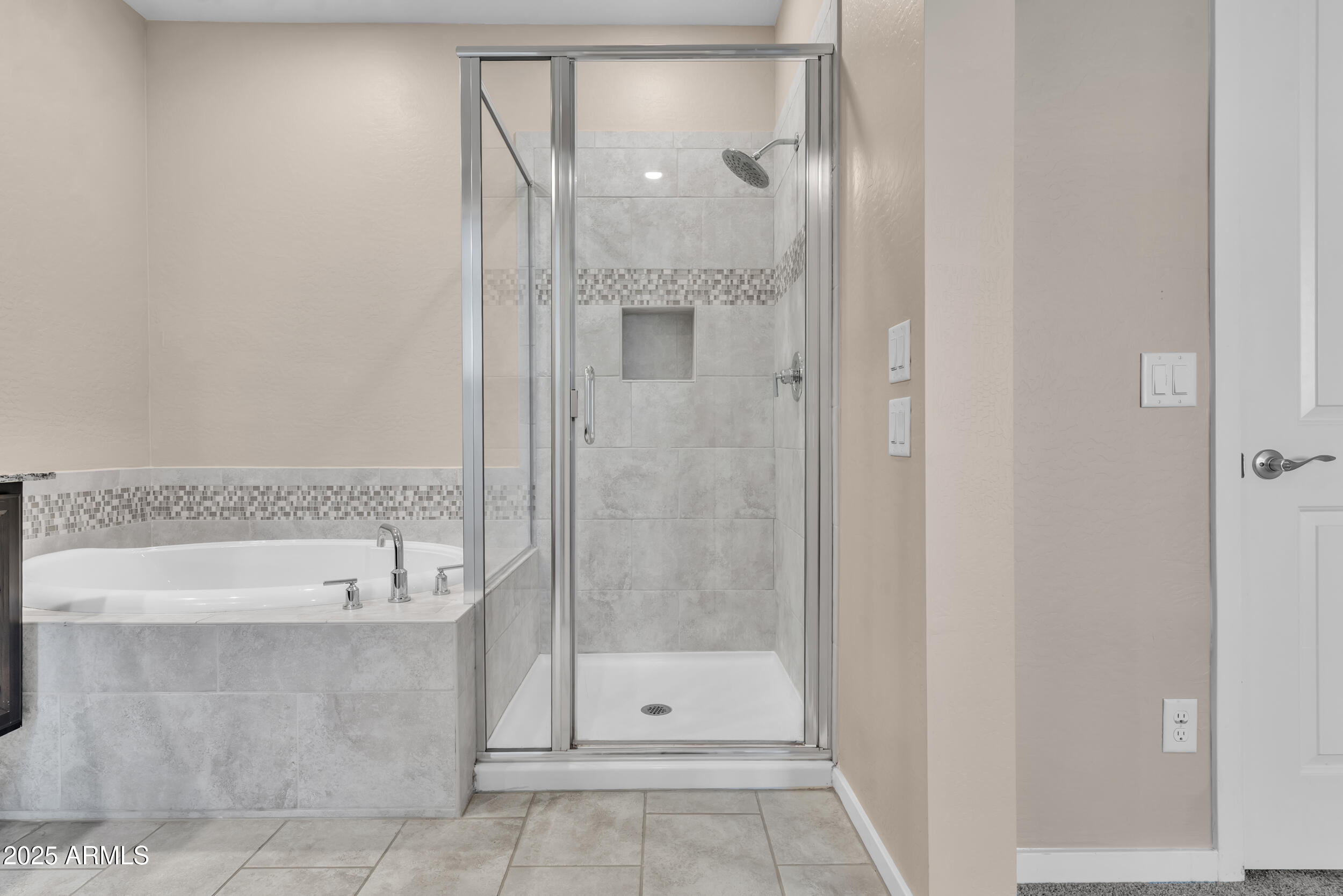 3855 South McQueen Road, Unit 98 Chandler, AZ 85286 - Photo 22 of 41 a bathroom with a bathtub and a shower