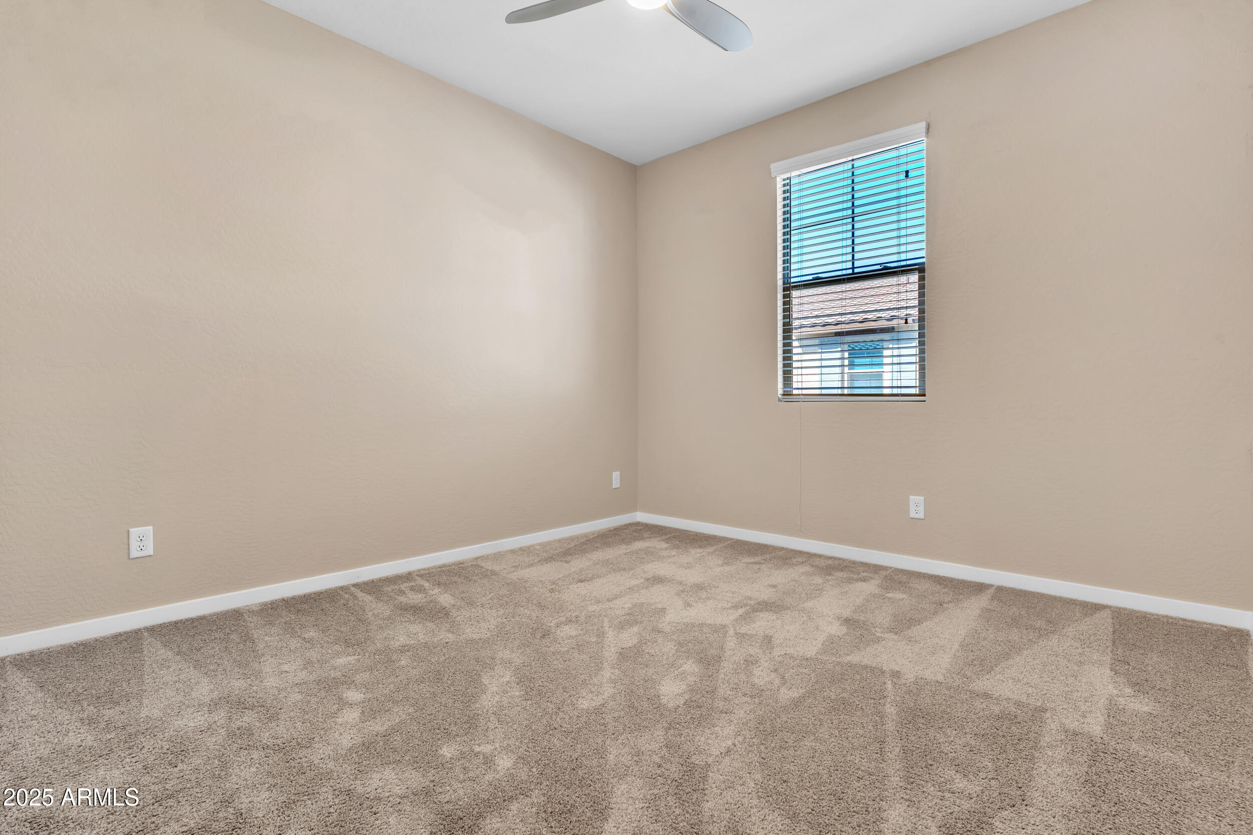 3855 South McQueen Road, Unit 98 Chandler, AZ 85286 - Photo 30 of 41 an empty room with windows