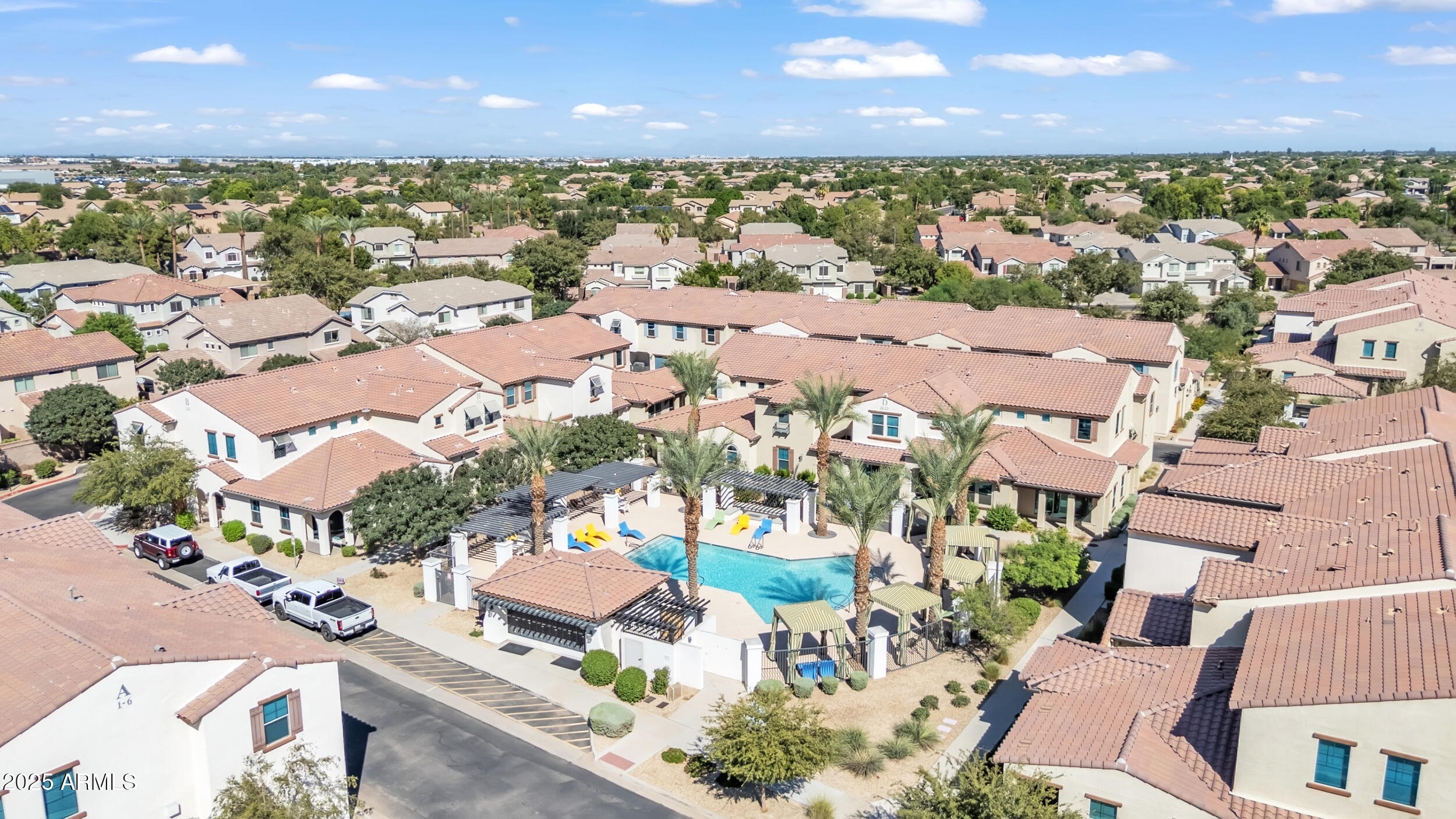 3855 South McQueen Road, Unit 98 Chandler, AZ 85286 - Photo 34 of 41 an aerial view of residential houses with outdoor space and ocean view