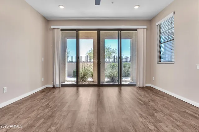 an empty room with windows