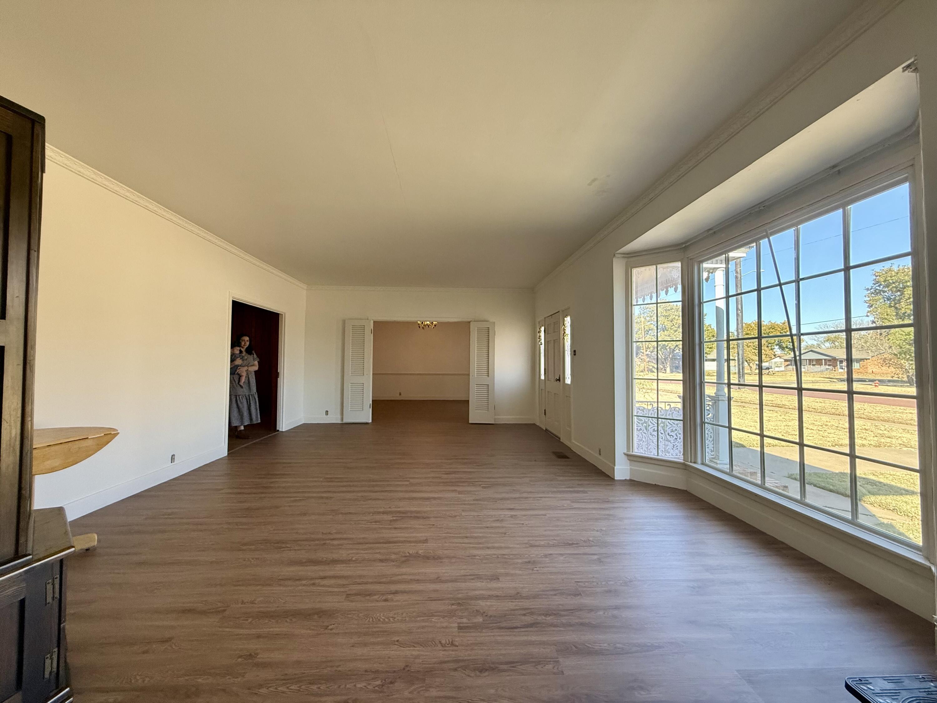321 10th Street Memphis, TX 79245 - Photo 18 of 33 a view of an empty room with a window
