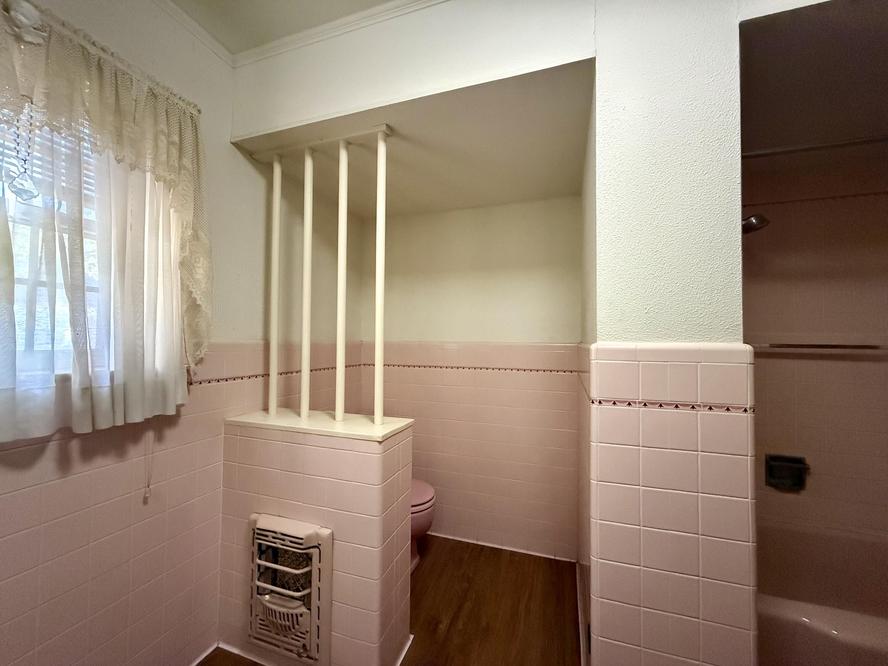 321 10th Street Memphis, TX 79245 - Photo 21 of 33 a bathroom with a sink and a mirror