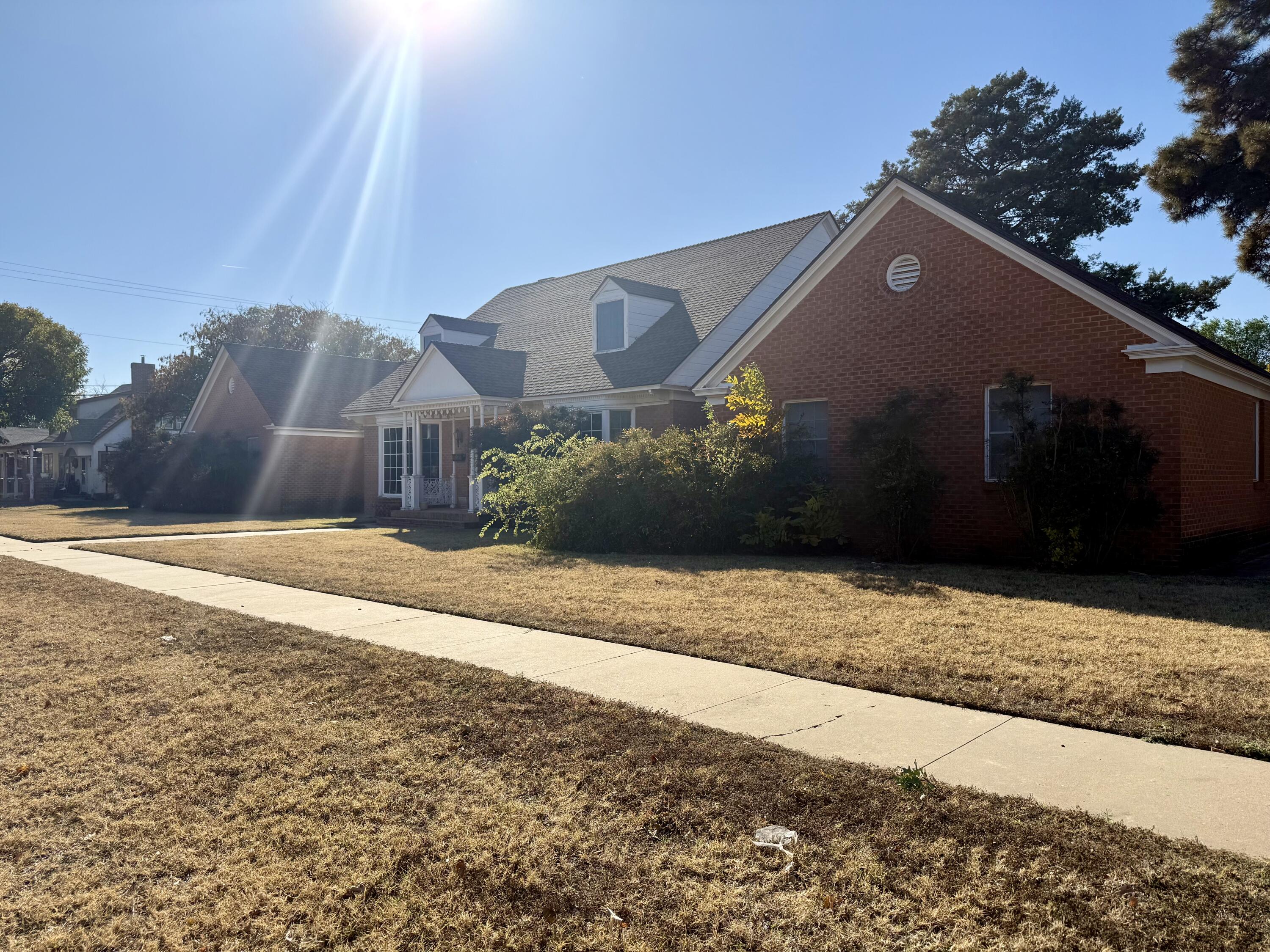 321 10th Street Memphis, TX 79245 - Photo 3 of 33 a house view with a outdoor space