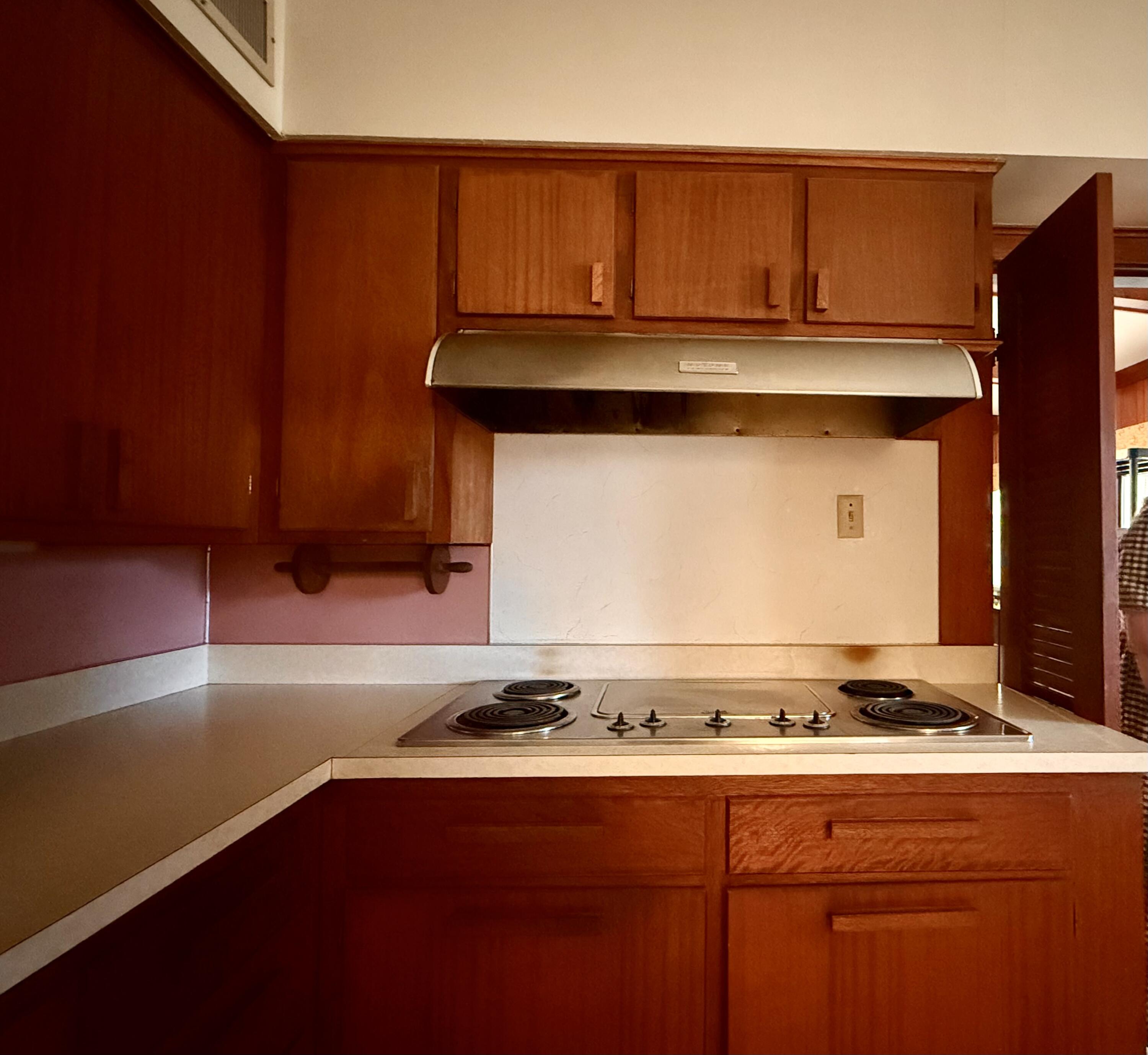 321 10th Street Memphis, TX 79245 - Photo 33 of 33 a stove top oven sitting inside of a kitchen