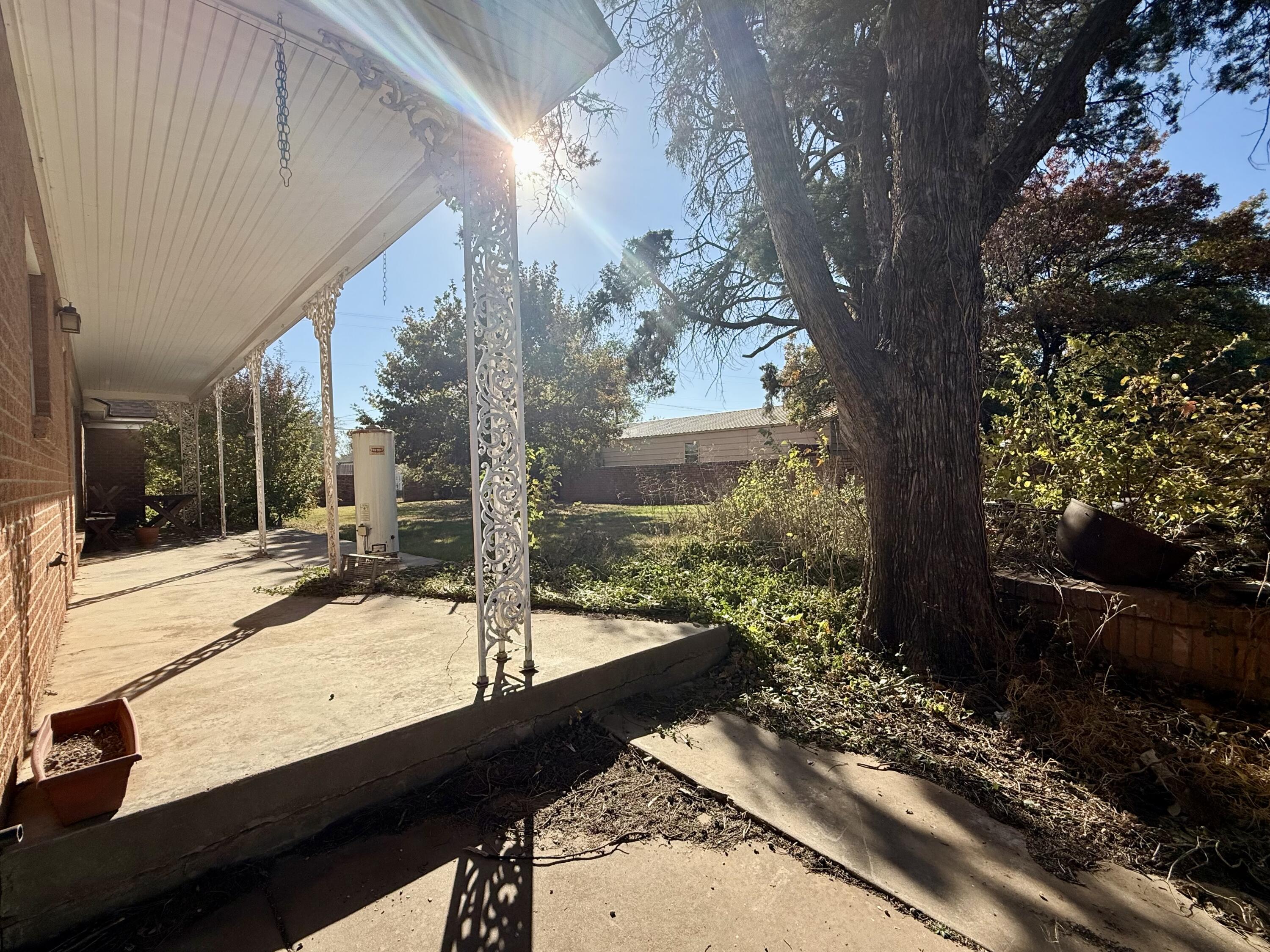 321 10th Street Memphis, TX 79245 - Photo 6 of 33 a view of a patio with a yard