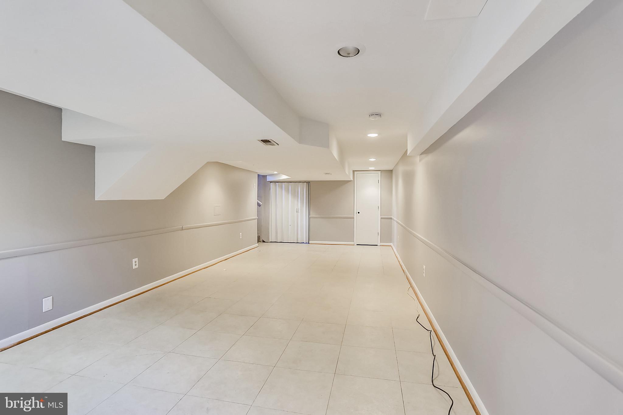 12907 Dean Road Silver Spring, MD 20906 - Photo 27 of 33 Finished lower level recreation room