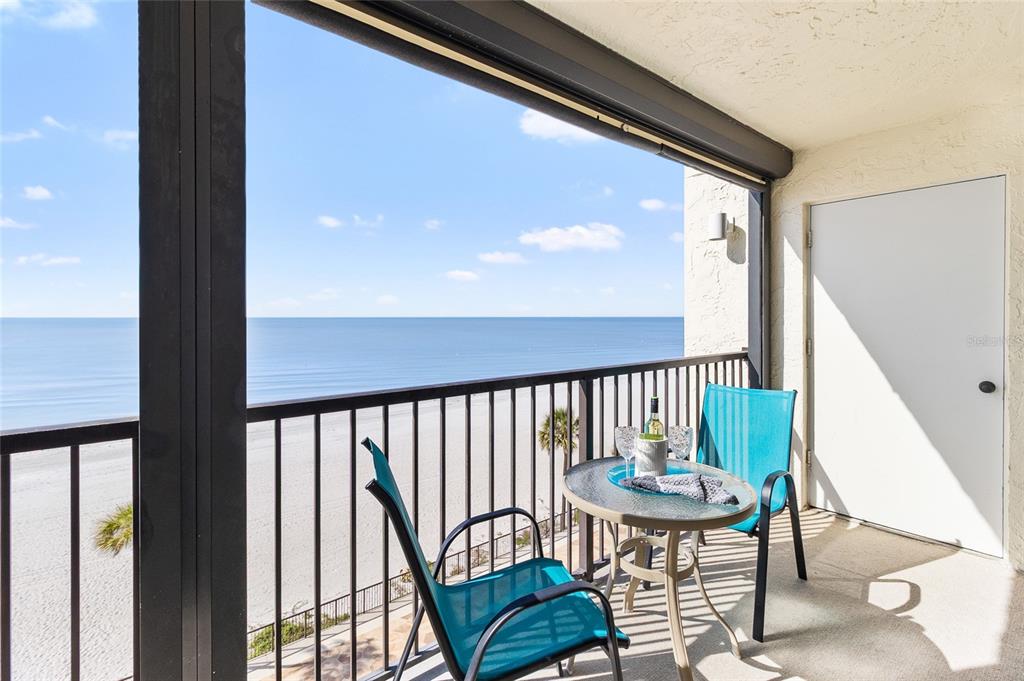 15000 Gulf Boulevard, Unit 605 Madeira Beach, FL 33708 - Photo 26 of 54 a view of a balcony with chairs