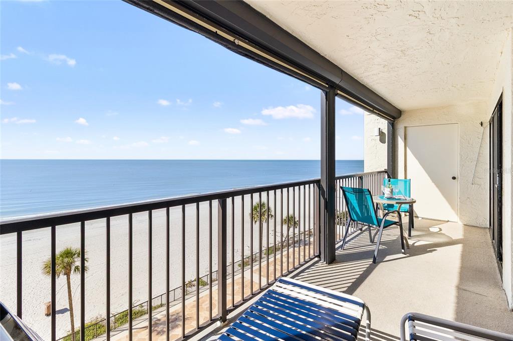15000 Gulf Boulevard, Unit 605 Madeira Beach, FL 33708 - Photo 29 of 54 a view of a chairs and table in the balcony