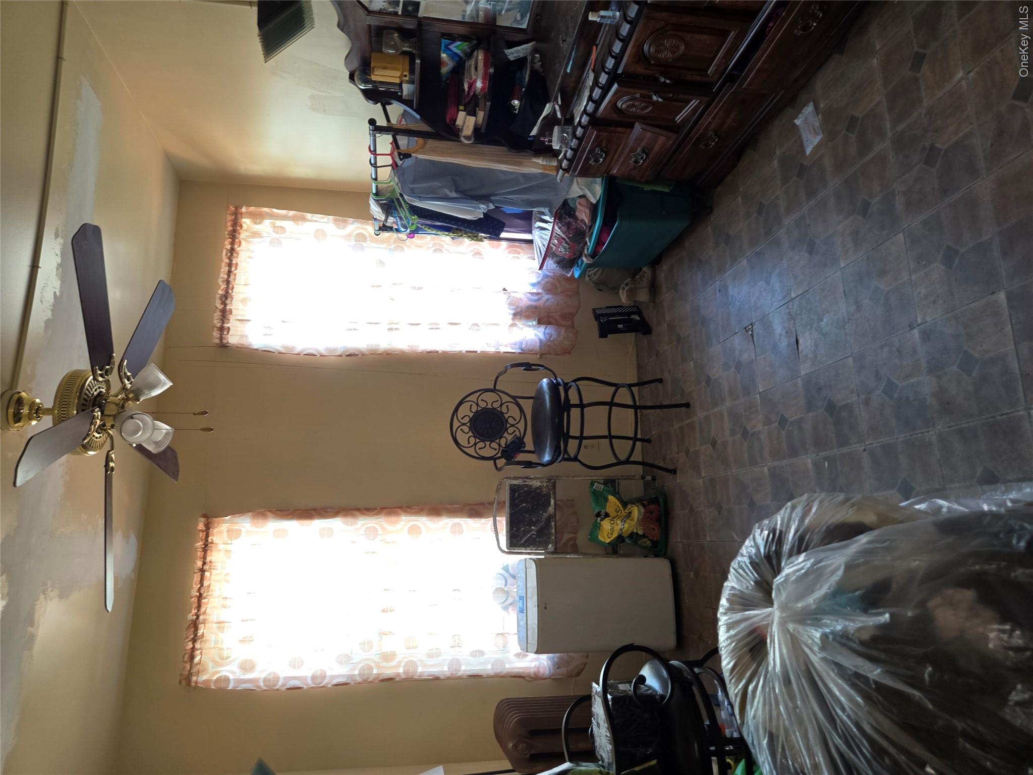 343 Rutland Road Brooklyn, NY 11225 - Photo 5 of 17 Bedroom featuring a ceiling fan