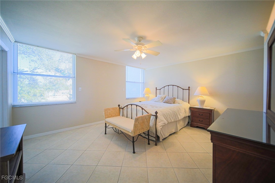 5959 Winkler Road, Unit 206 Fort Myers, FL 33919 - Photo 11 of 50 a bedroom with a bed and a window