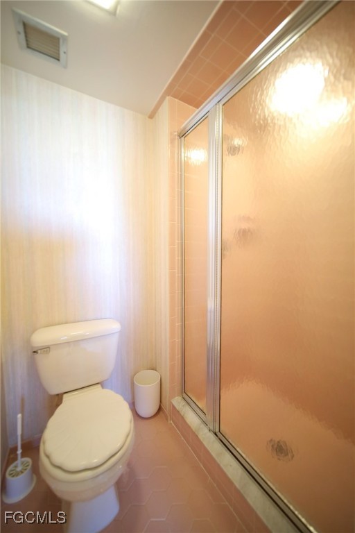 5959 Winkler Road, Unit 206 Fort Myers, FL 33919 - Photo 16 of 50 a bathroom with a toilet and a shower