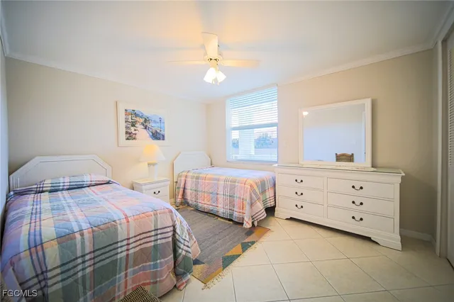 an aerial view of residential houses with outdoor space and swimming pool