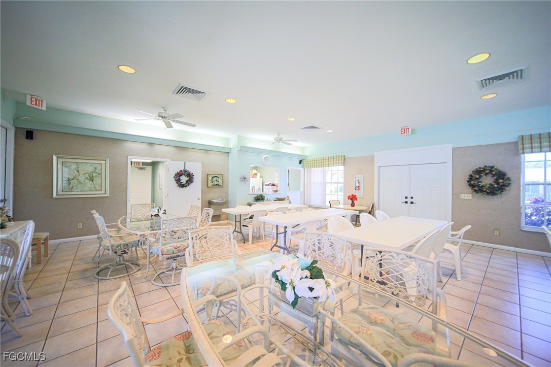 5959 Winkler Road, Unit 206 Fort Myers, FL 33919 - Photo 25 of 50 a view of a dining room with furniture