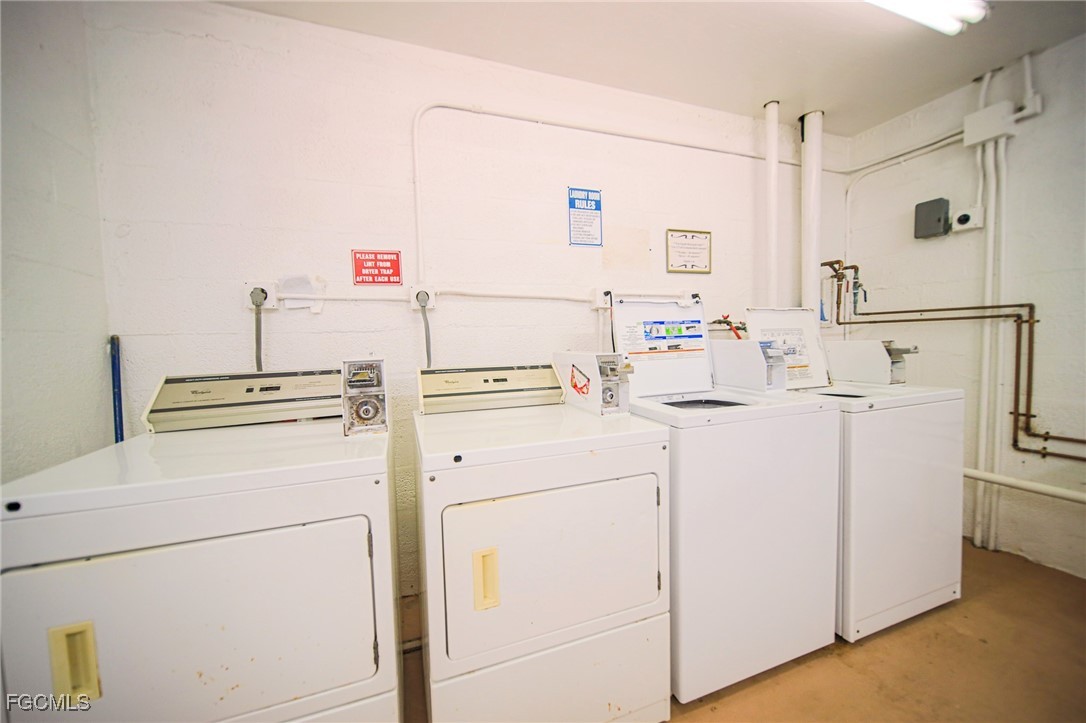 5959 Winkler Road, Unit 206 Fort Myers, FL 33919 - Photo 31 of 50 a utility room with dryer and washer