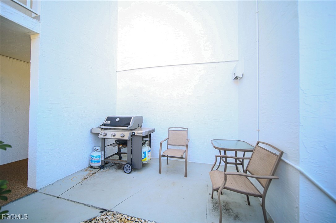 5959 Winkler Road, Unit 206 Fort Myers, FL 33919 - Photo 41 of 50 a work room with table and chairs