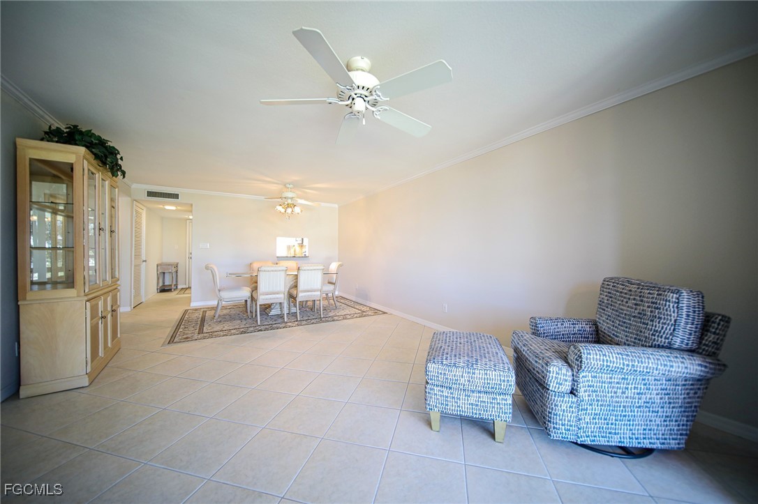 5959 Winkler Road, Unit 206 Fort Myers, FL 33919 - Photo 5 of 50 a living room with furniture and white walls