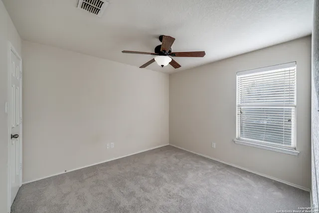 a window in an empty room