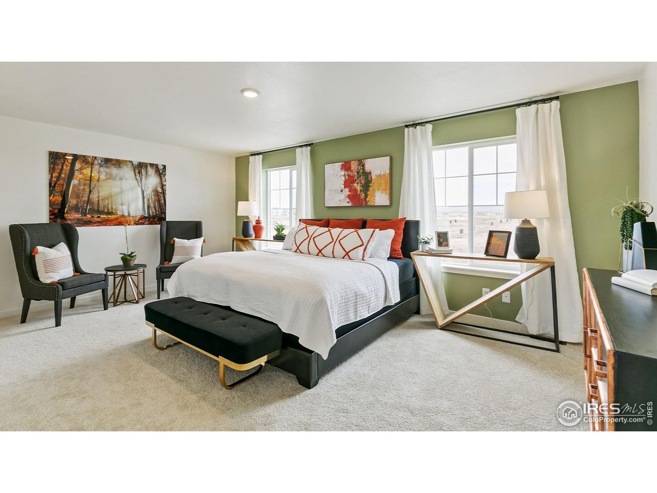 942 London Way Severance, CO 80550 - Photo 18 of 26 a bedroom with a bed and glass windows