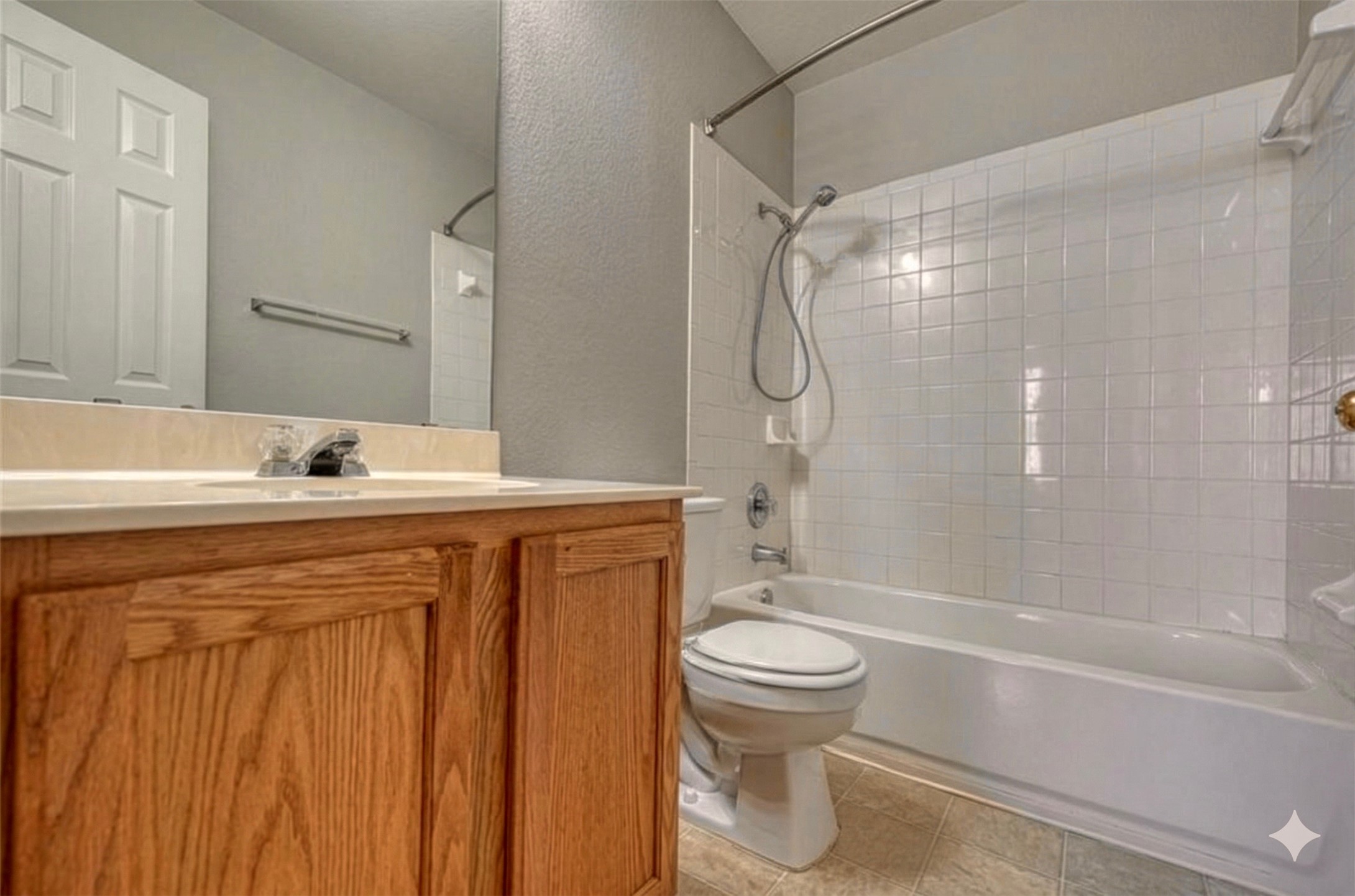 15543 Miss Adrienne's Path Pflugerville, TX 78660 - Photo 7 of 9 a bathroom with a sink a toilet and shower