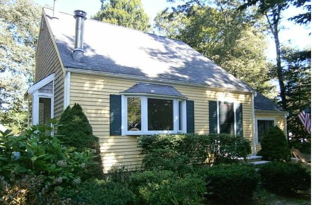 89 Pimlico Pond Road Mashpee, MA 02649 - Photo 1 of 14 a view of a house with a tree
