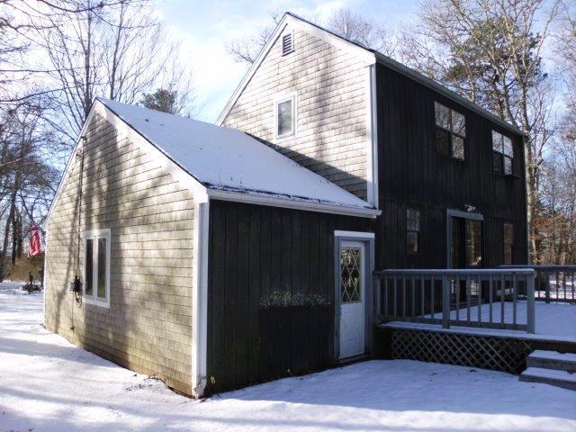 89 Pimlico Pond Road Mashpee, MA 02649 - Photo 14 of 14 a view of a house with a yard