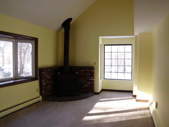 89 Pimlico Pond Road Mashpee, MA 02649 - Photo 3 of 14 a bedroom with a bed and a window
