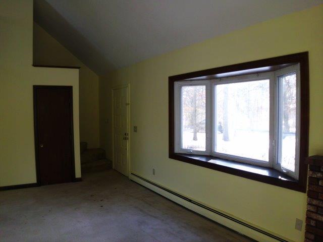 89 Pimlico Pond Road Mashpee, MA 02649 - Photo 5 of 14 a view of a room that has a window in it