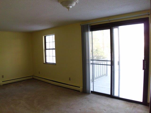 89 Pimlico Pond Road Mashpee, MA 02649 - Photo 6 of 14 an empty room with a window