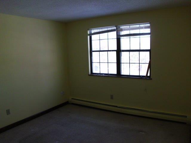 89 Pimlico Pond Road Mashpee, MA 02649 - Photo 8 of 14 an empty room with a window