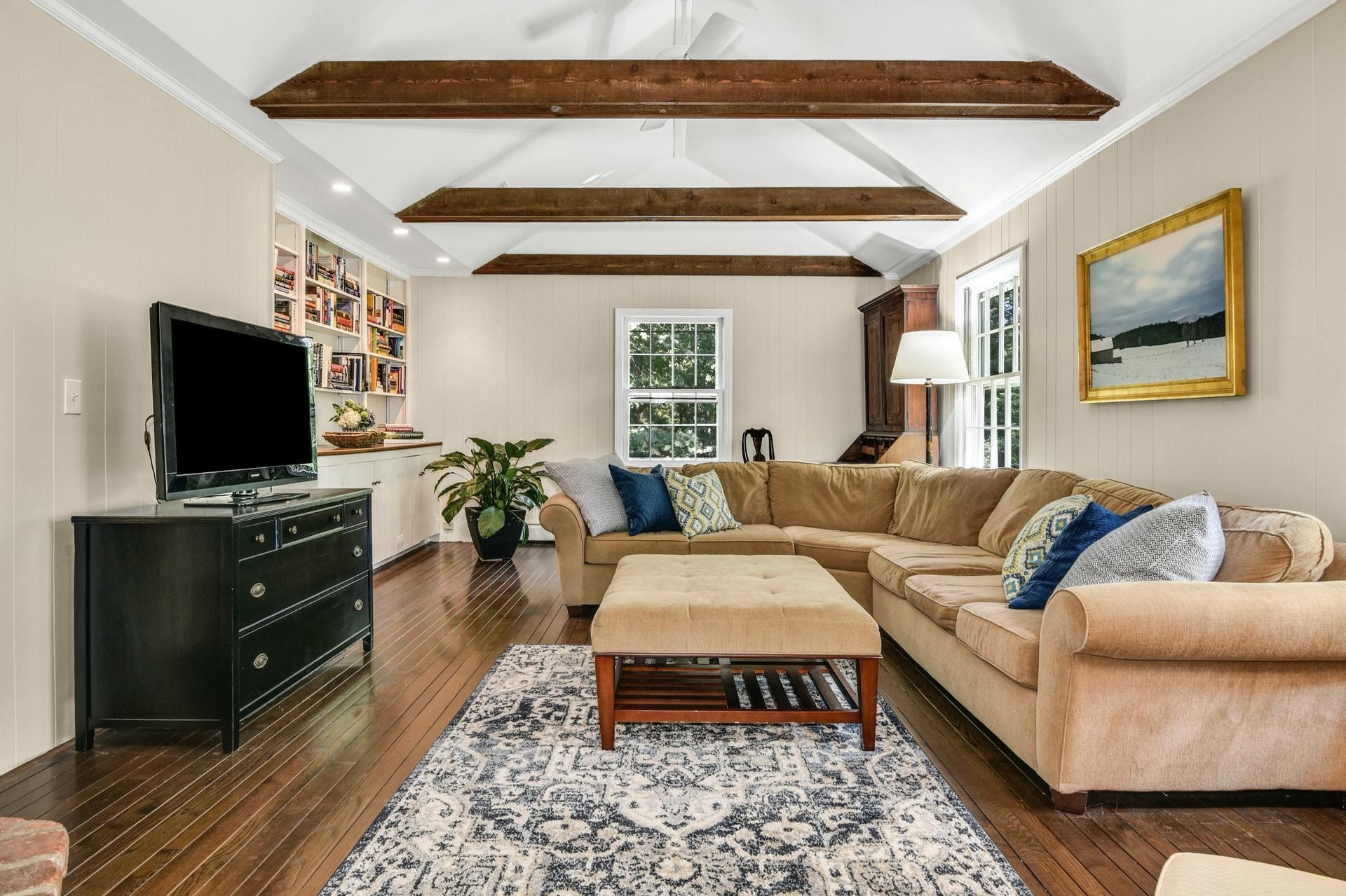 32 Delafield Island Road Darien, CT 06820 - Photo 6 of 34 a living room with furniture and a flat screen tv