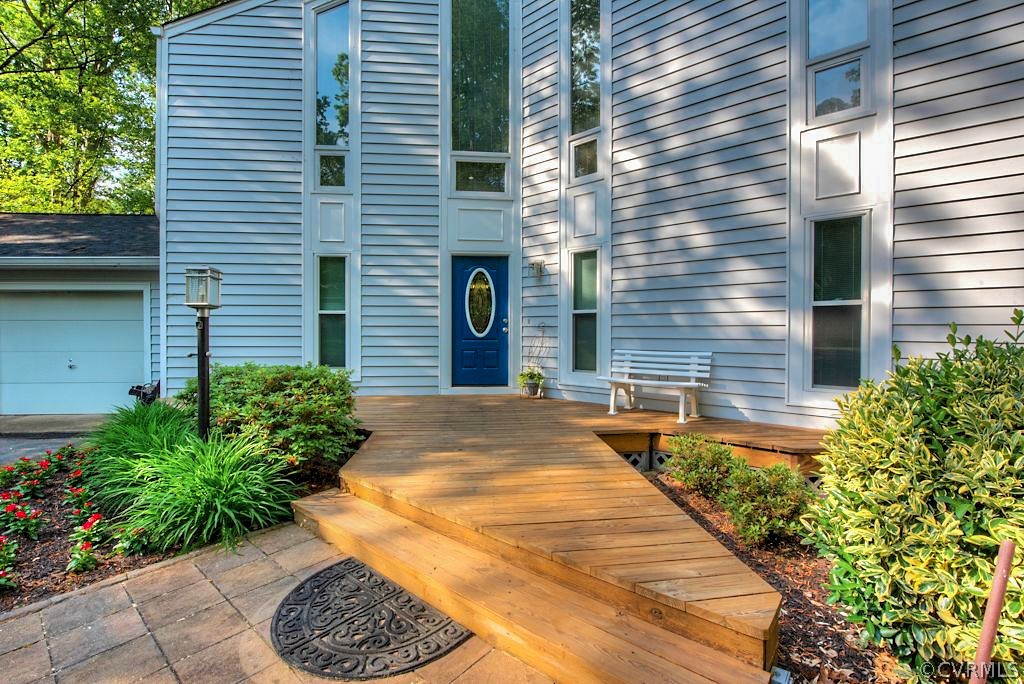 3506 Walkers Ferry Road Midlothian, VA 23112 - Photo 3 of 50 a pathway of a house with potted plants