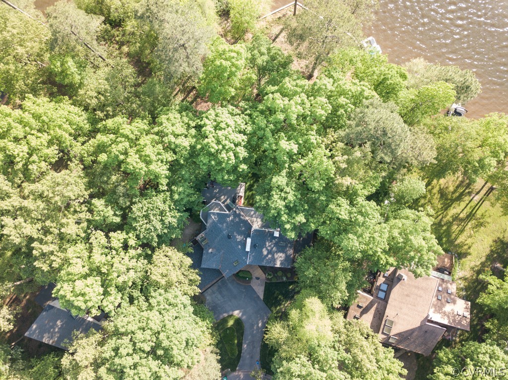 3506 Walkers Ferry Road Midlothian, VA 23112 - Photo 47 of 50 view of a tree with lawn chairs under an umbrella