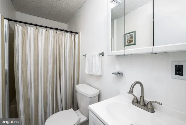 a view of balcony with wooden floor