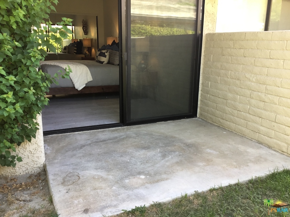 1111 East Ramon Road, Unit 8 Palm Springs, CA 92264 - Photo 14 of 36 a view of a porch
