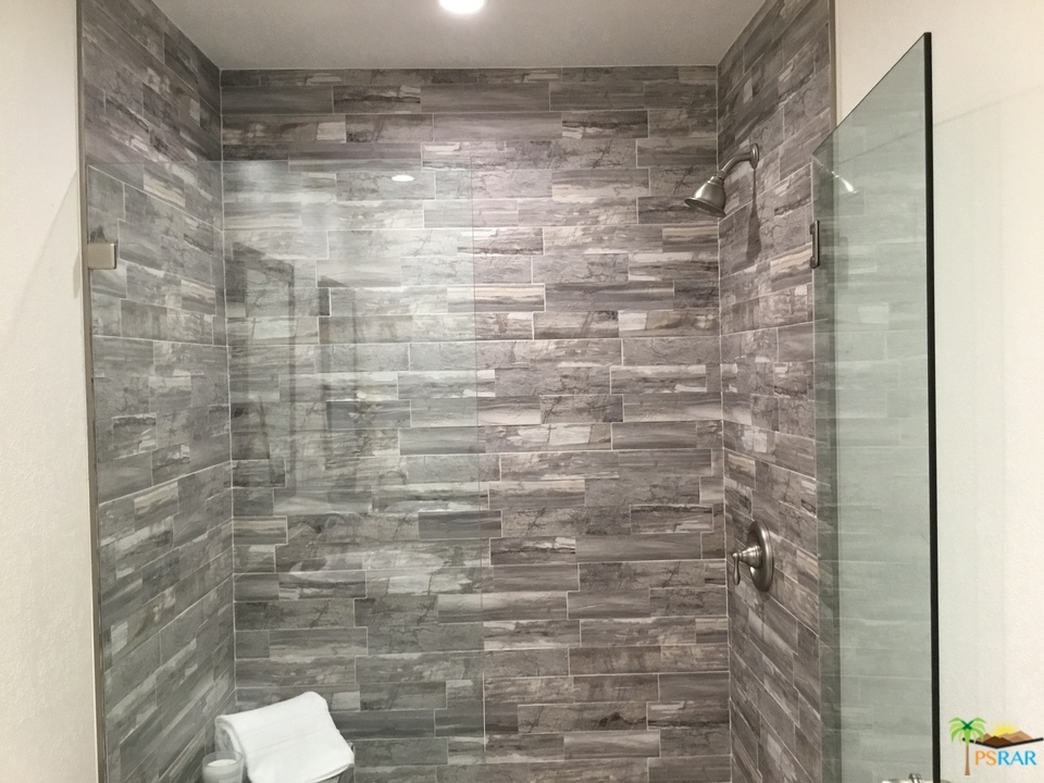 1111 East Ramon Road, Unit 8 Palm Springs, CA 92264 - Photo 20 of 36 a bathroom with a shower