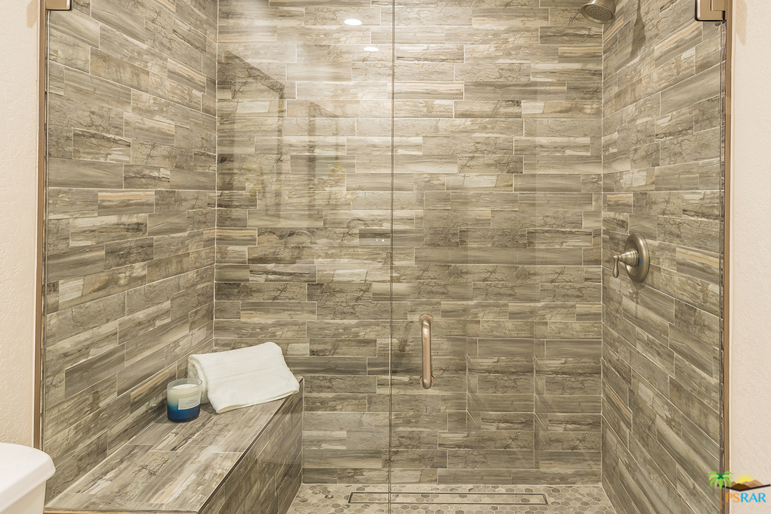 1111 East Ramon Road, Unit 8 Palm Springs, CA 92264 - Photo 21 of 36 a bathroom with a shower