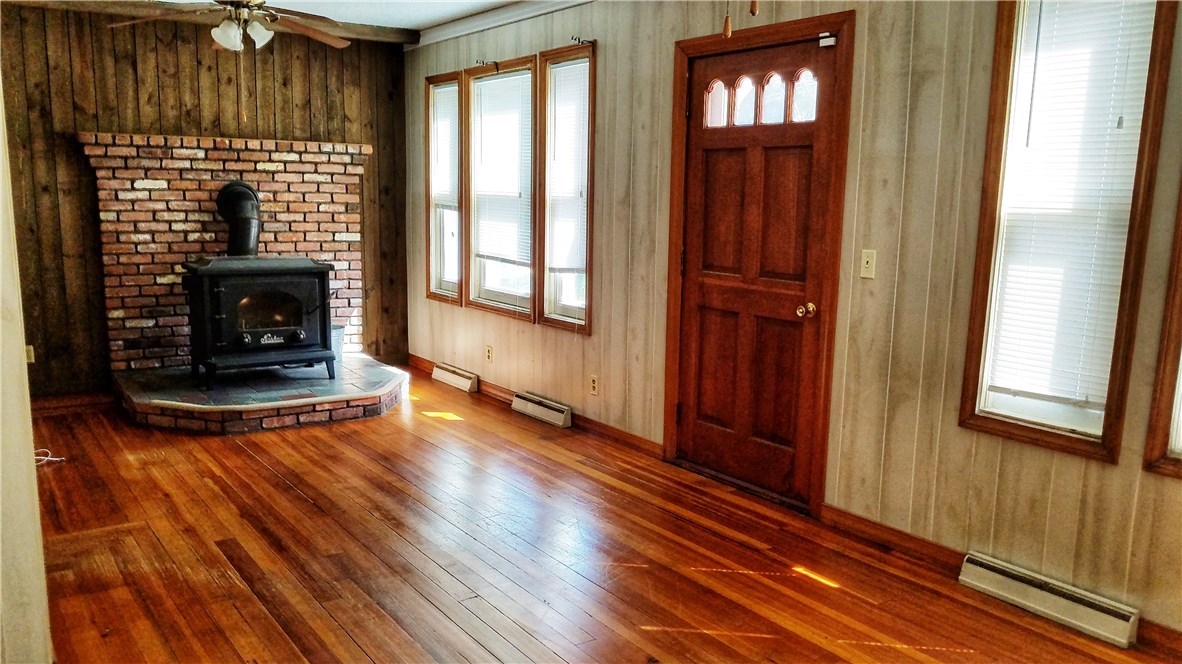 193 Transit Street Woonsocket, RI 02895 - Photo 11 of 22 Wood stove to make it cozy
