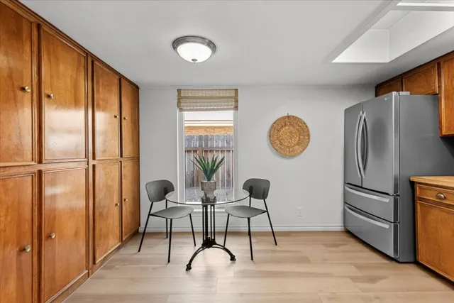 a view of a livingroom with furniture and windows