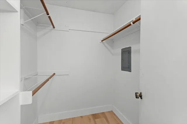 a bathroom with a shower and a sink