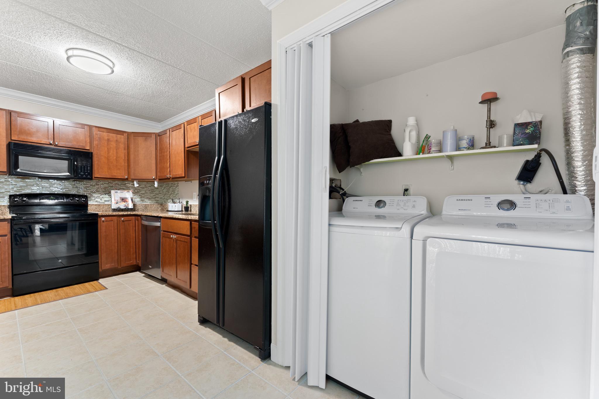 11617 Windbluff Court, Unit 9B Reston, VA 20191 - Photo 25 of 46 Washer and dryer in unit