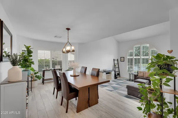 a living room with furniture and window