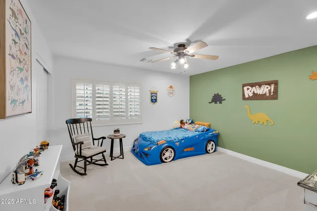 a view of a backyard with sitting area