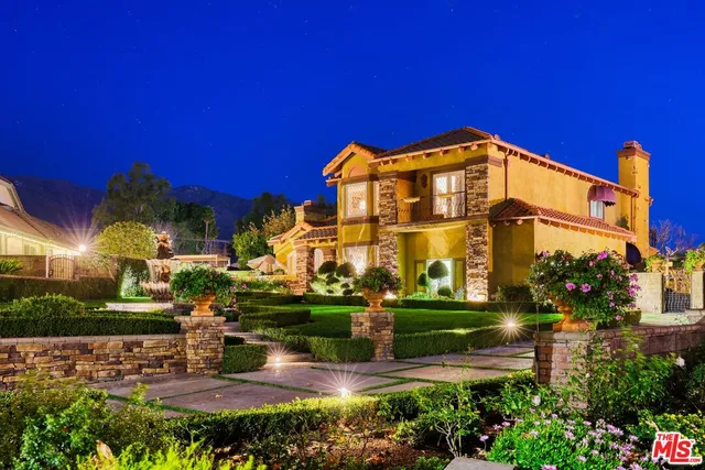 a view of a building with a yard