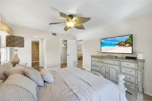 a bedroom with a bed and furniture